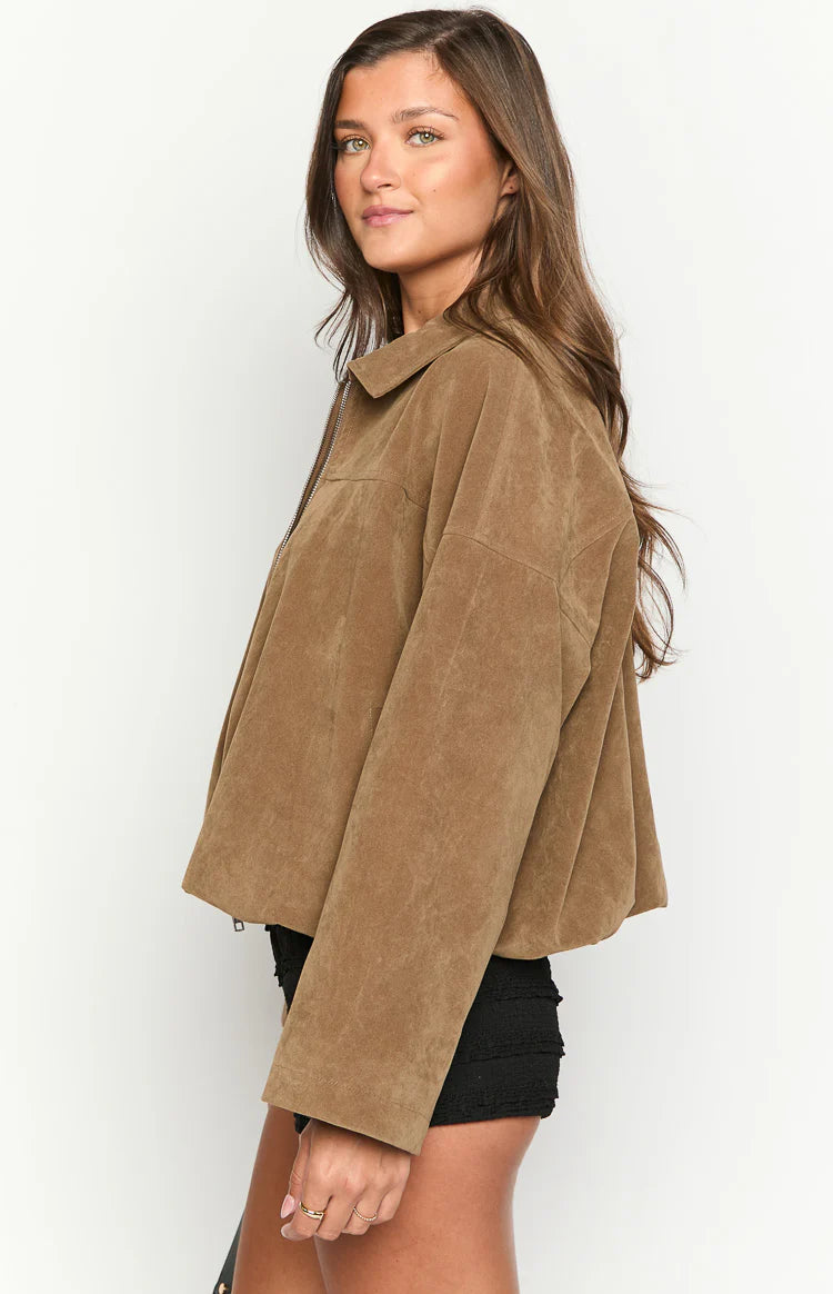 Unzipped front view of a brown suedette bomber jacket showing its relaxed fit and bubble hem