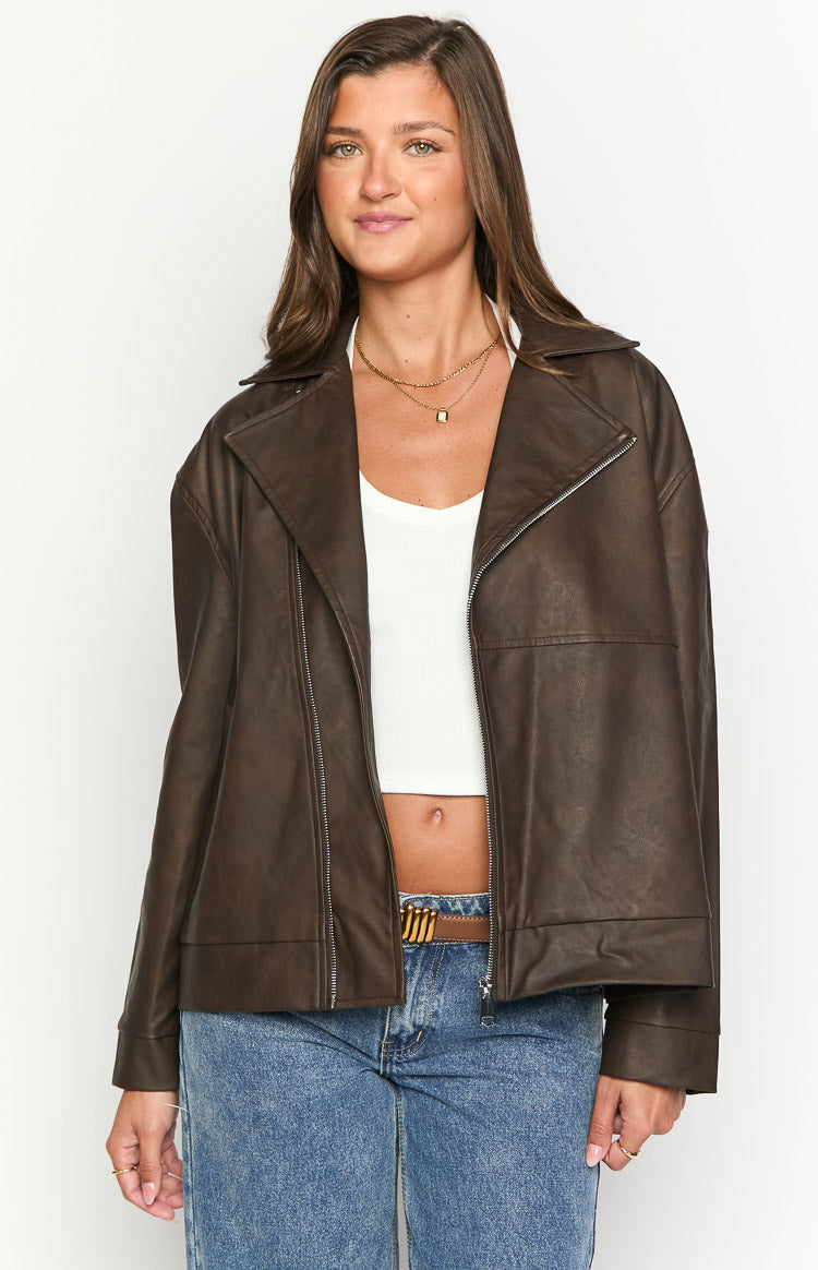 Chocolate brown oversized PU biker jacket with wide notched lapels and an open silver asymmetrical zipper