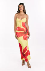 Yellow maxi dress with red hibiscus print, featuring a ruched bust with a central drawstring tie