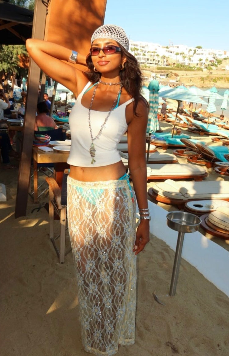 Sheer pale yellow sequin lace maxi skirt with intricate floral pattern