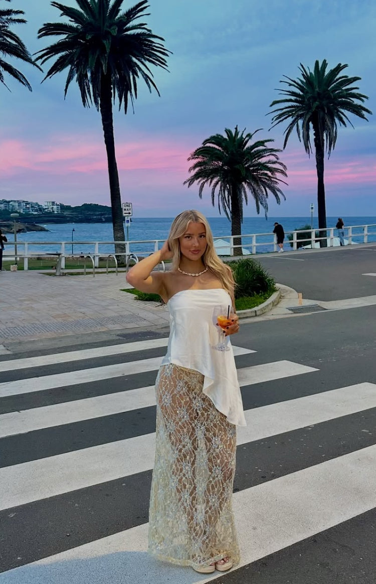 Beginning Boutique Sabella White and Blue Sequin Lace Maxi Skirt white sheer lace maxi skirt with blue sequin embellishments