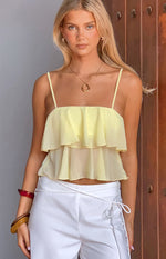 Beginning Boutique Sabina Yellow Ruffle Top pale yellow sheer tiered ruffle crop top with spaghetti straps