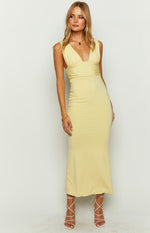 Yellow sleeveless maxi dress with a deep V-neckline and ruched detailing under the bust
