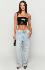 Front view of a black sequin strapless crop top with a straight neckline