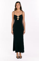 Black maxi dress with gold hibiscus trim, bust cutout, thin spaghetti straps, and ruffled hem