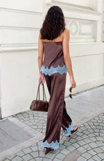 Beginning Boutique Shirley Lace Trim Brown Satin Pants brown satin wide-leg pants with light blue lace trim at the hem