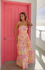Yellow floral print strapless maxi dress with a ruched bodice and a full, flowing skirt