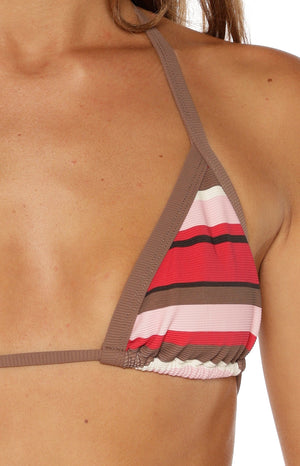 Model wearing a multi stripe triangle bikini top with contrast binding perfect for a beach day