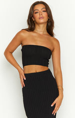 Close-up of the black ribbed knit bandeau top, highlighting the textured fabric and cropped fit