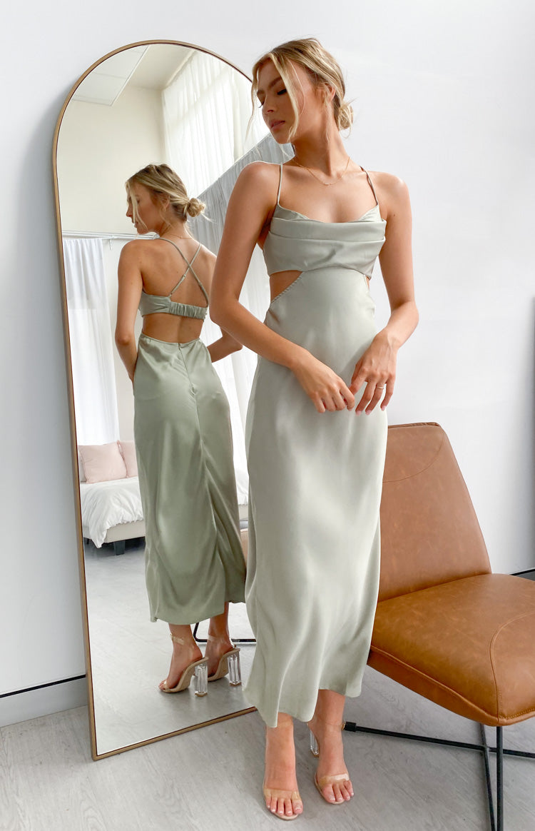 Sage silky maxi dress with cowl neckline, side cutouts, and criss-cross back straps