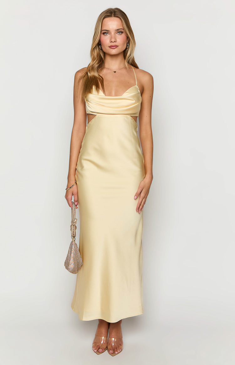 Yellow satin maxi dress with a draped cowl neckline and prominent side waist cutouts