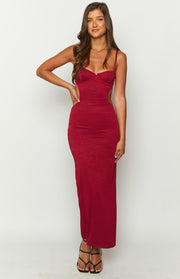 Front view of a red ribbed knit maxi dress with a bustier sweetheart neckline and side cutouts