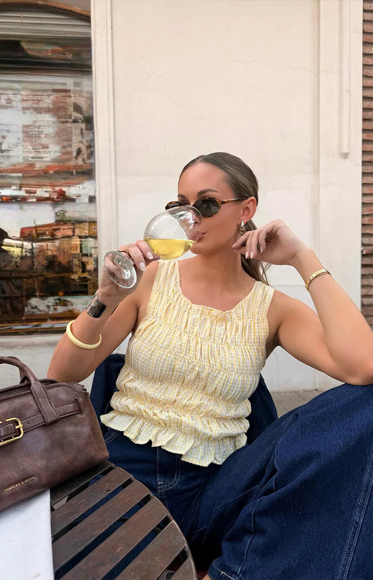 Beginning Boutique Tango Yellow Top yellow gingham check shirred square neck sleeveless top with ruffled hem