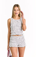 A white shorts with a black polka dot pattern