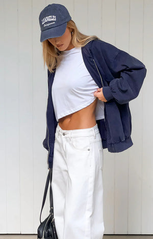 Beginning Boutique Tate Washed Navy Oversized Hooded Jacket washed navy oversized hooded jacket with full zip front and elast