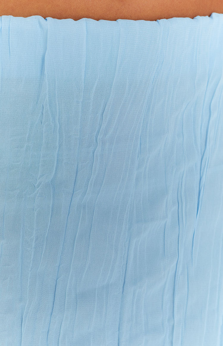 Side view of a light blue crinkled maxi skirt with a relaxed, flowy fit