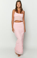 Front view of a light pink crinkled maxi skirt with a flowy silhouette