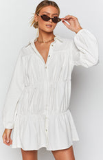 White textured collared dress with a button-down front and gathered tiered skirt