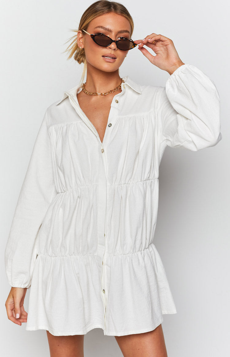White textured collared dress with a button-down front and gathered tiered skirt