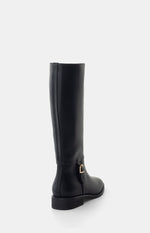 Side view of a black PU riding boot with a gold buckle detail on the ankle and a low block heel