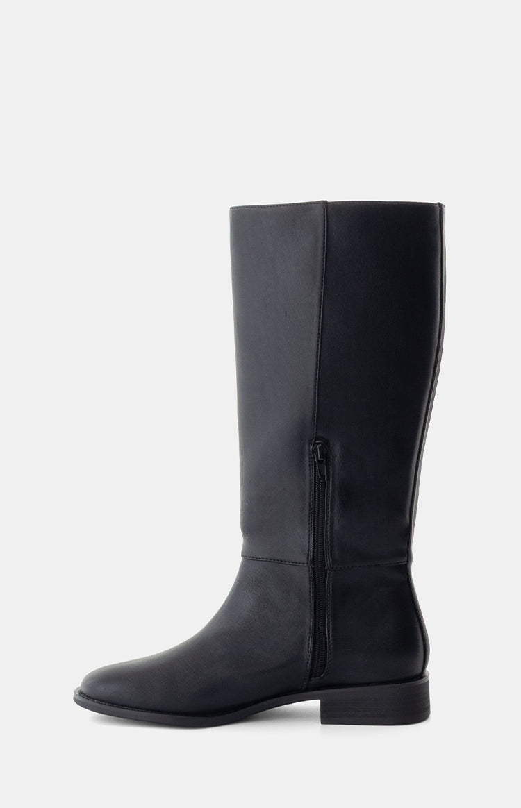 Side view of a black PU riding boot with a full-length inner zipper, elastic calf panel, and low block heel
