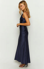 Side view of a navy satin maxi dress showing the ruched bodice and flowing skirt