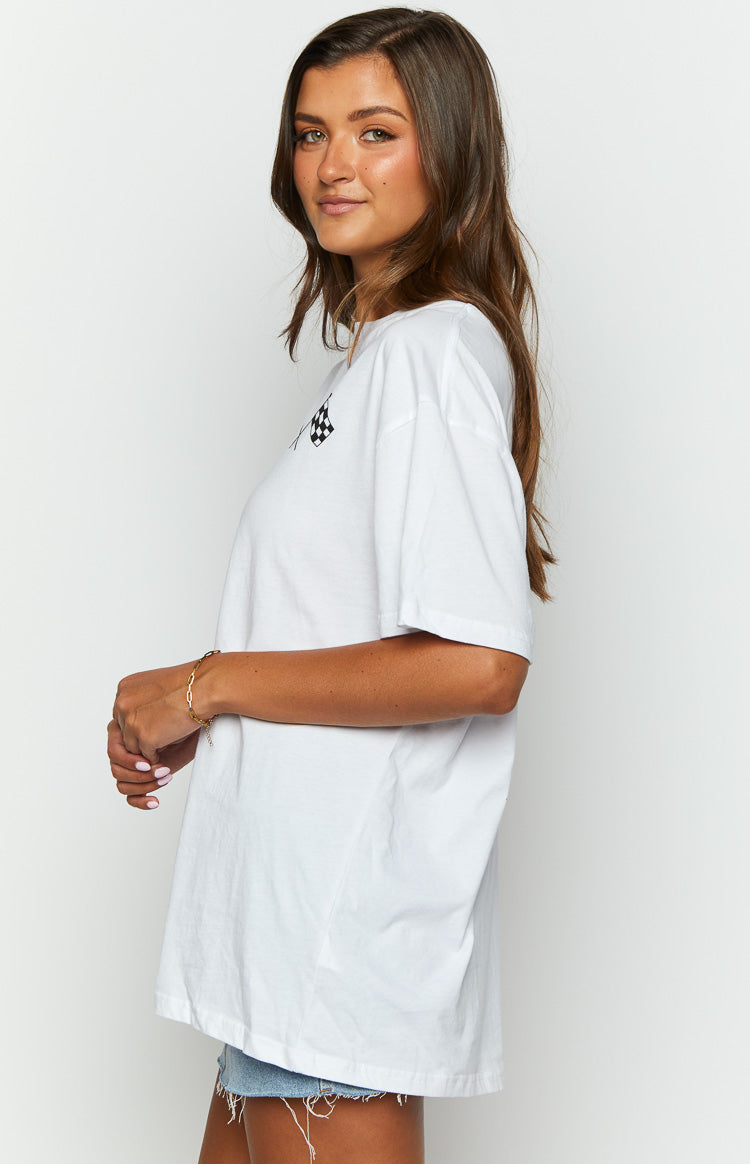 Side view of a white oversized t-shirt with a small black and white checkered flag graphic
