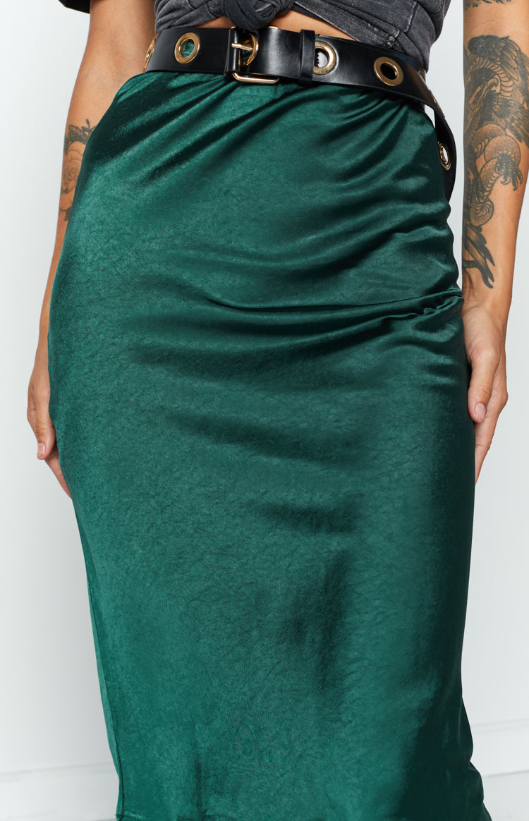 Emerald green silky midi skirt with a bias cut and gentle A-line flare at the hem