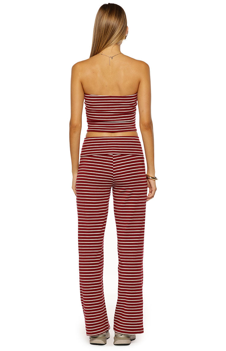 Rear view of the burgundy and white striped strapless tube top, showing its fitted, cropped silhouette