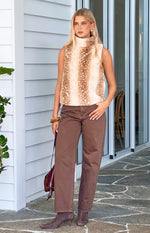 Full length view of brown carrot fit jeans with a relaxed leg and tapered ankle