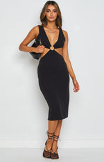 Black sleeveless midi dress with deep V-neckline, gold O-ring detail, and side waist cutouts