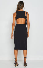 Black sleeveless bodycon midi dress with a high back and large waist cutouts