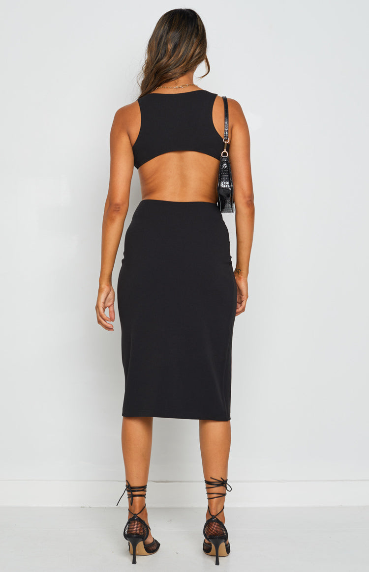 Black sleeveless bodycon midi dress with a high back and large waist cutouts