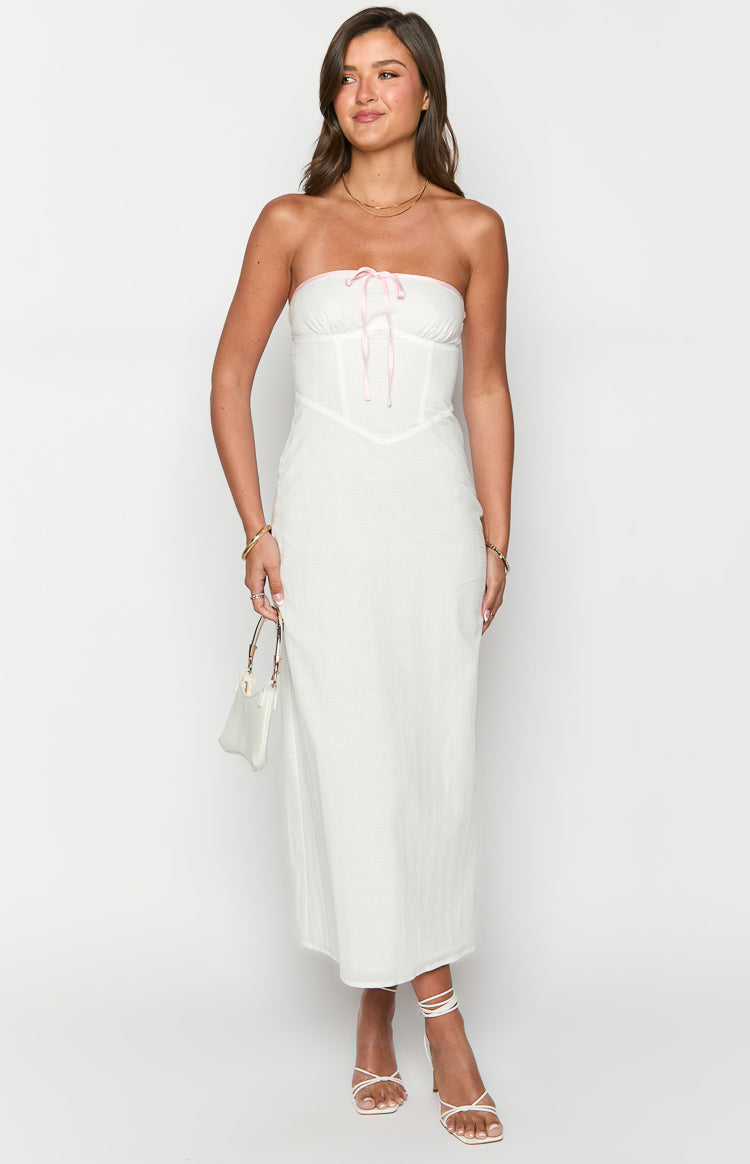 White textured strapless maxi dress with pink ribbon tie bust and bodice seams