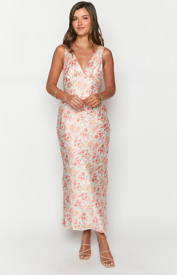 Front view of a light floral paisley print satin maxi dress with a V-neckline and diamond grid pattern