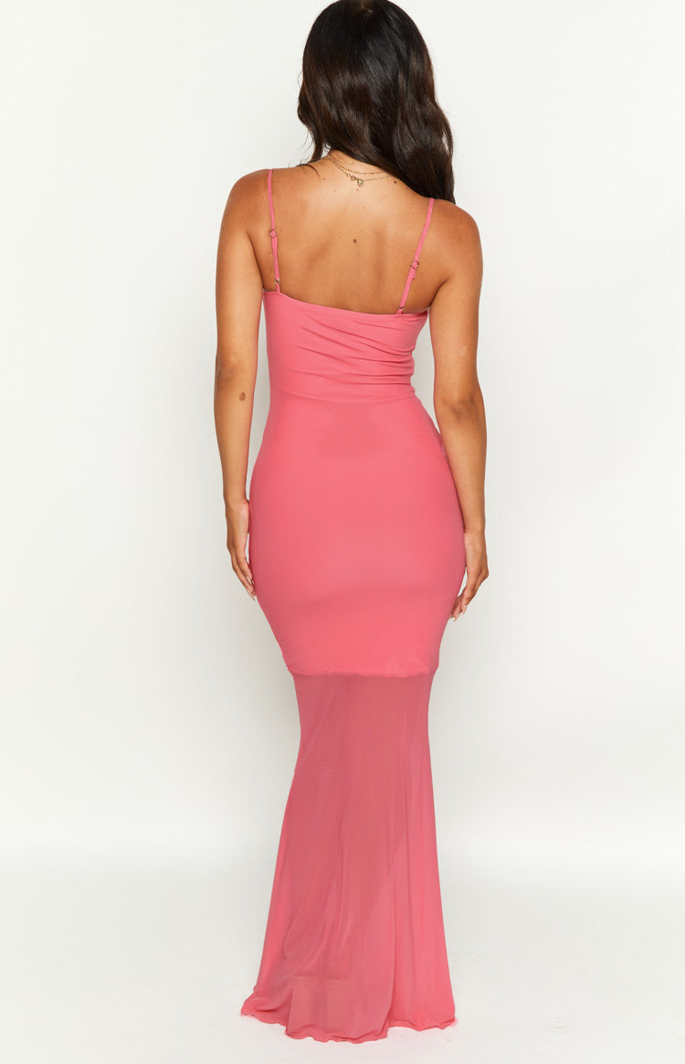 Rear view of a pink mesh maxi dress showing the ruched back bodice and sheer flowing mesh skirt