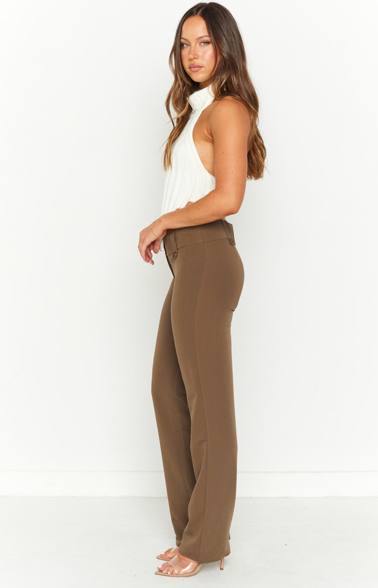 Side view of taupe low waist pants with a flat front and straight-leg silhouette