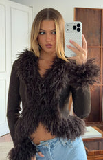 Chocolate ribbed knit cardigan with shaggy fur trim V-neckline, long sleeves with fur cuffs, and cropped hem
