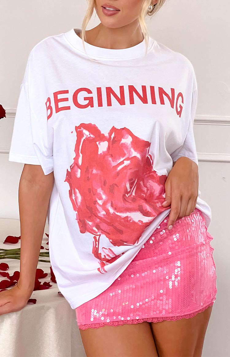 Close-up of the pink sequin mini skirt with a delicate lace trim at the hem