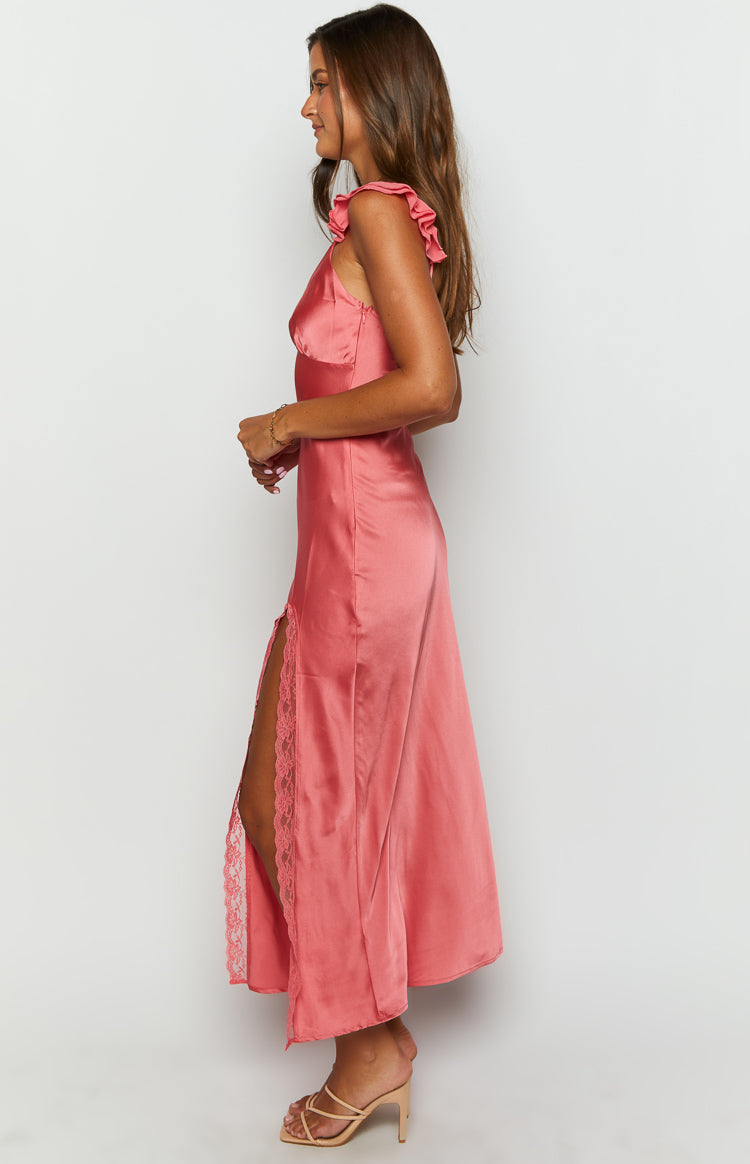 Side view of a pink satin maxi dress with ruffled cap sleeves, a high side slit, and lace trim along the slit