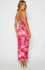 Rear-side view of a pink abstract floral print mesh bodycon maxi skirt