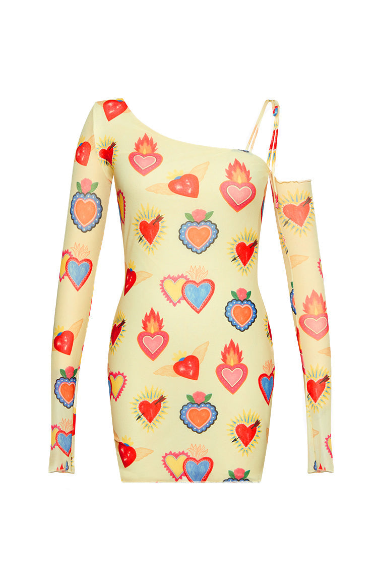 Yellow mesh mini dress with a colourful heart print, one long sleeve, and a cold-shoulder cutout with a spaghetti strap