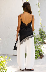 Ziva Black Satin Lace Trim Asymmetrical Top Image