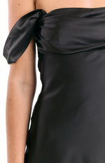 Close-up of the black satin off-the-shoulder sleeve with a gathered detail on the mini dress