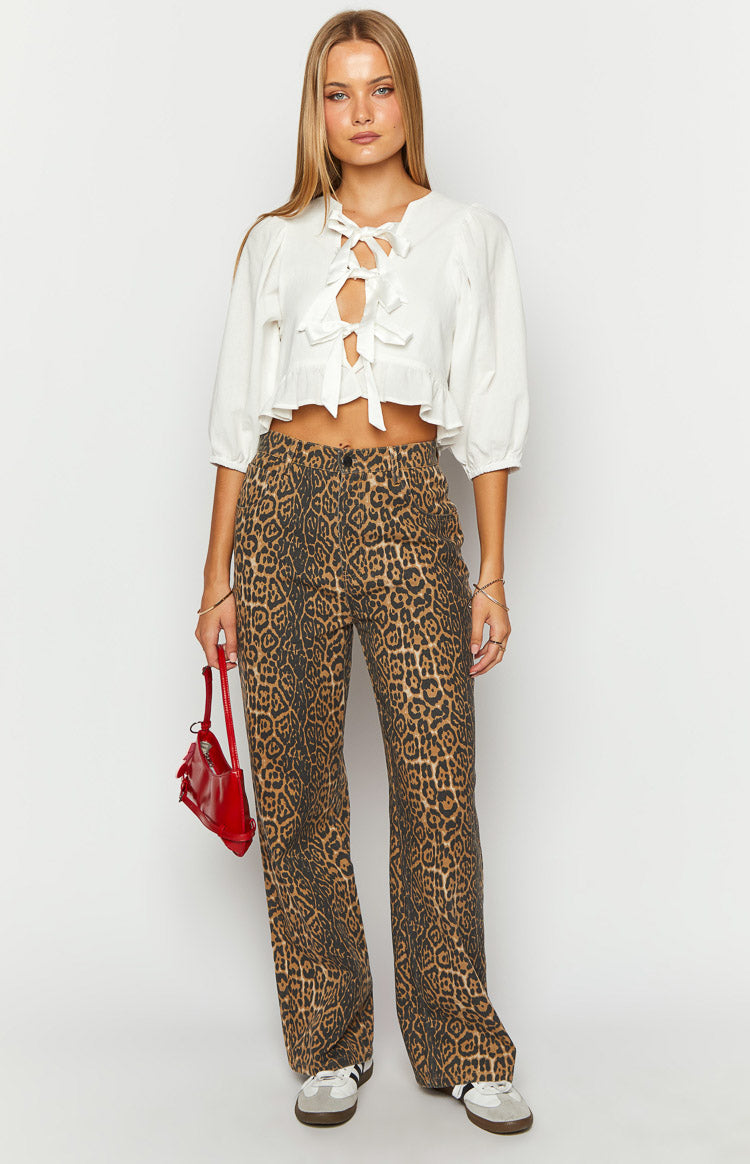 Brown and black leopard print straight leg jeans with a high waist and relaxed fit