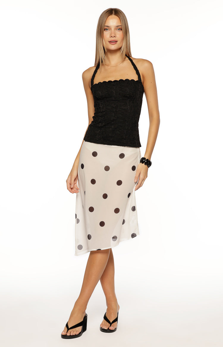 Fitted black lace halter neck top with a scalloped neckline and cropped length
