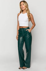Side view of forest green PU wide-leg pants, showing the high waist, smooth texture, and front pockets