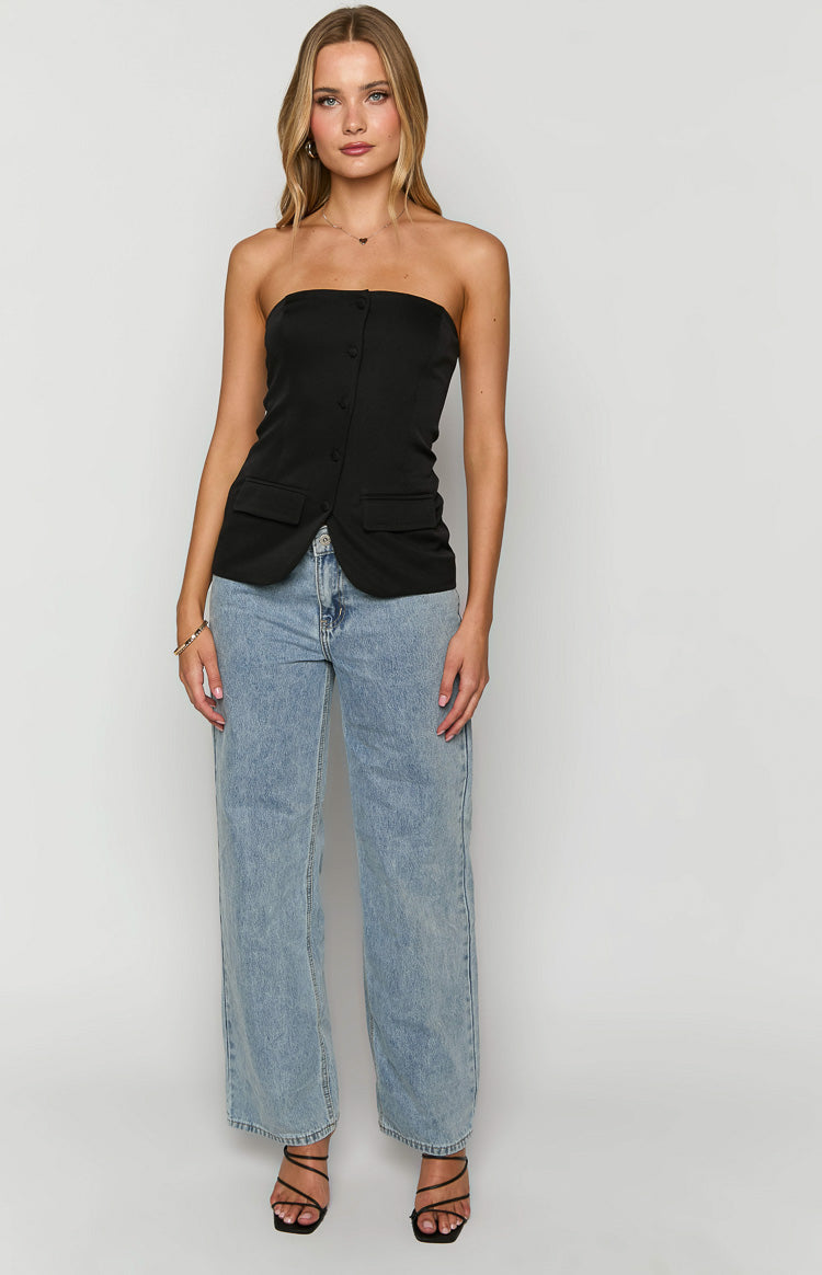 Front view of a black strapless button-up top with an angled placket and two small flap pockets at the hem