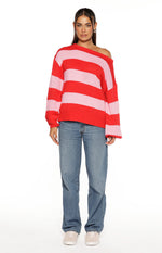 Relaxed red and pink striped knit sweater with a wide off-shoulder neckline and long cuffed sleeves