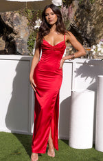 Red satin maxi dress with a ruched sweetheart neckline, thin spaghetti straps, and a high leg slit
